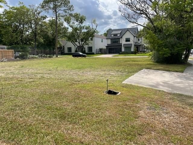 Northeast corner of lot looking towards Caudle Drive, and newly built home directly across street. Northeast corner of lot looking towards Caudle Drive, and newly built home directly across street.