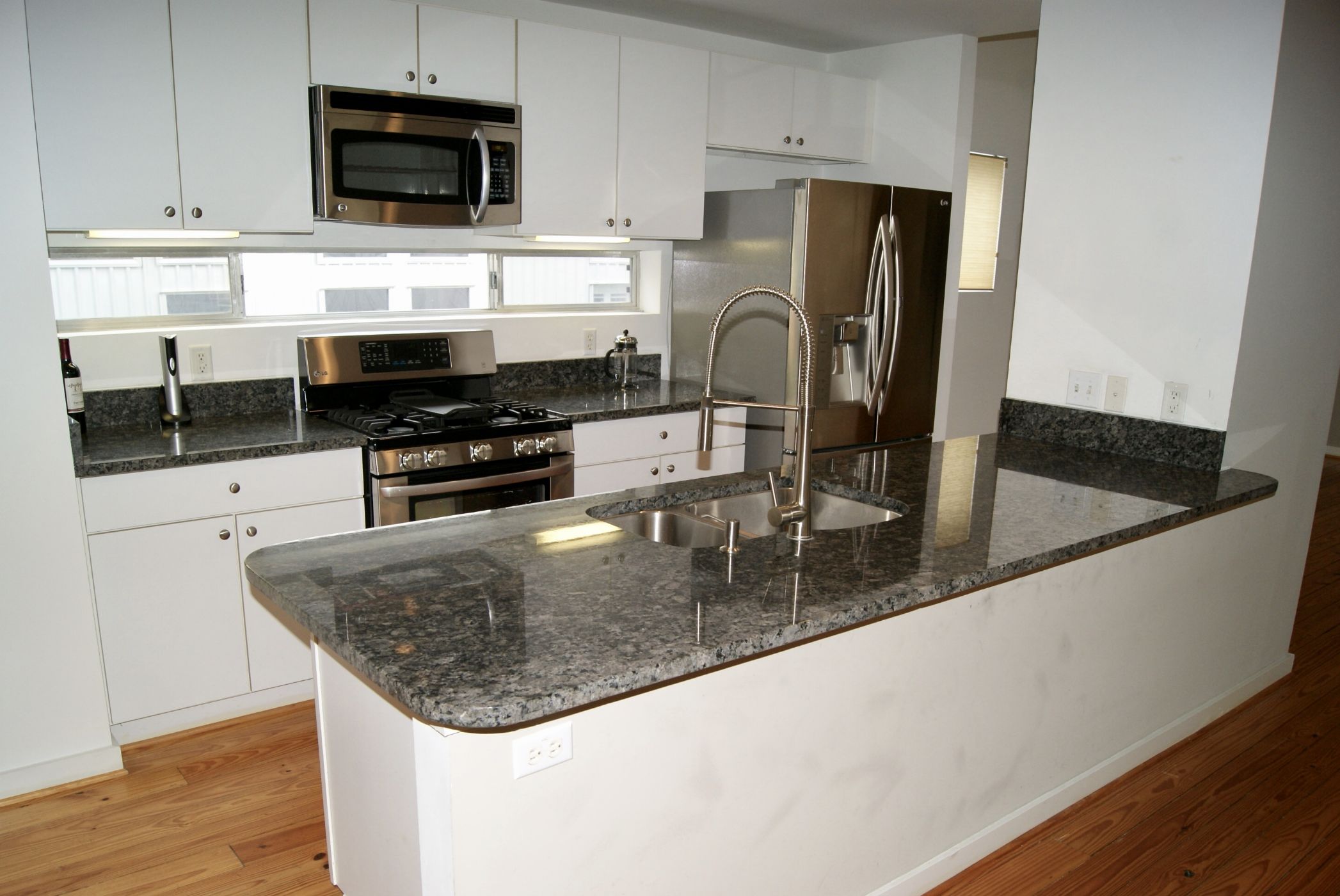 Gorgeous kitchen with stainless steel appliances and granite countertops Gorgeous kitchen with stainless steel appliances and granite countertops