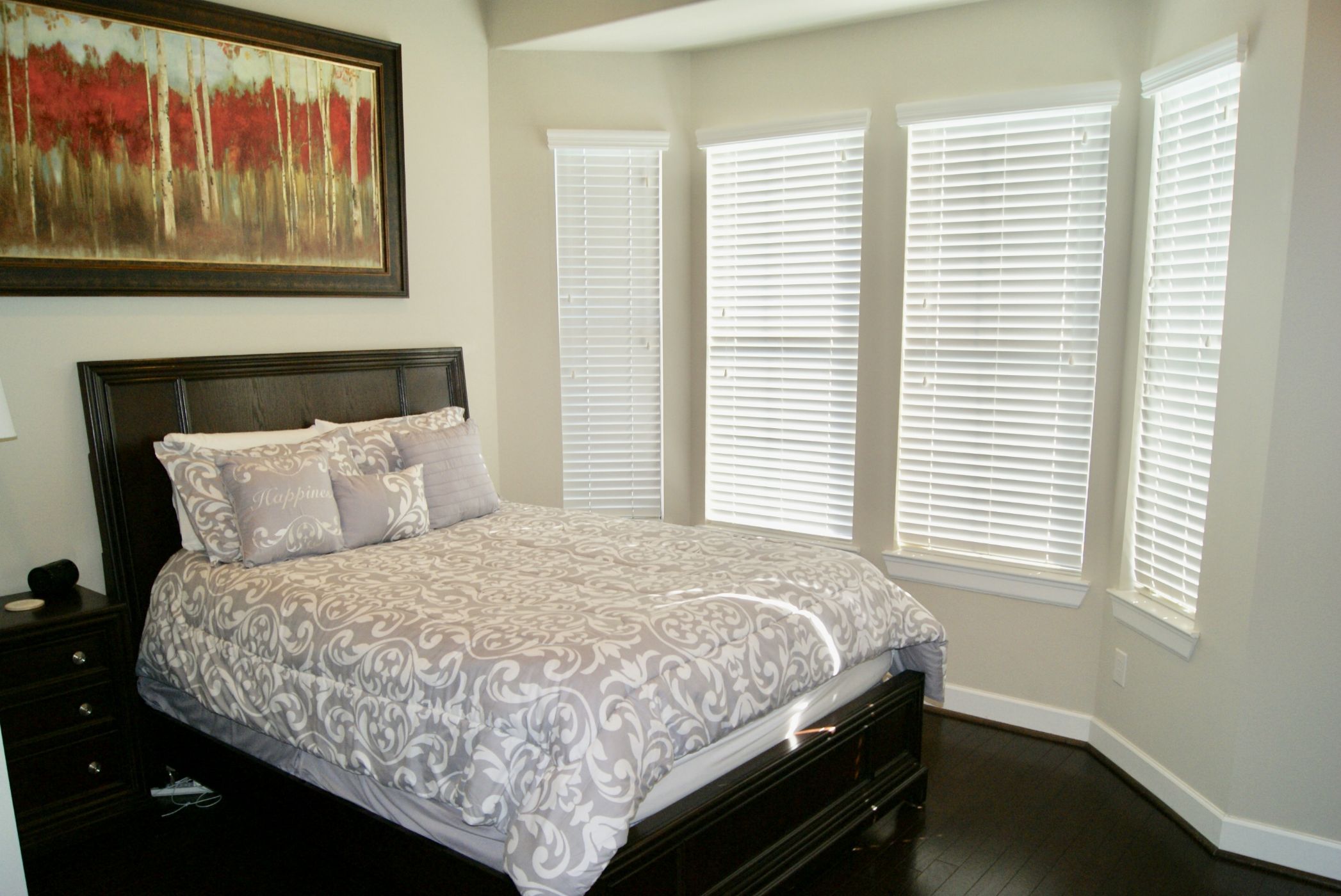 Master Bedroom with wood floors Master Bedroom with wood floors