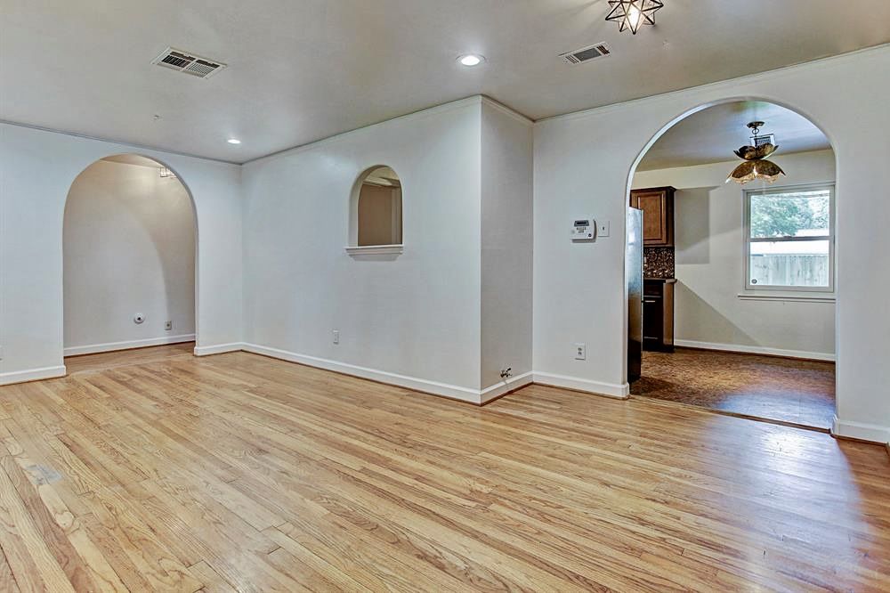 Living room with gleaming hardwood floors Living room with gleaming hardwood floors
