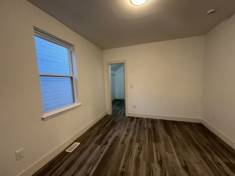 Main floor bedroom with walk in closet