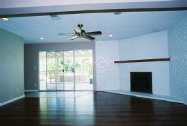 Living room with firplace and laminate flooring