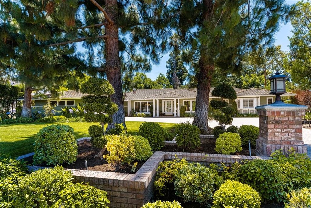 Front yard with custom hardscaping 