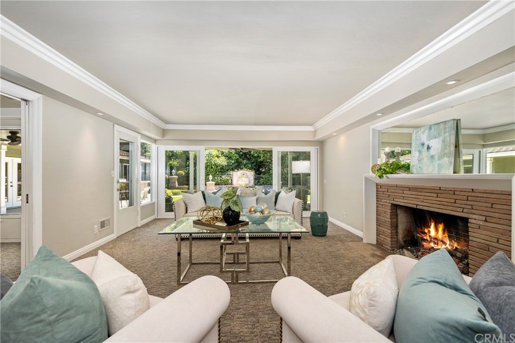 Front Living Room with classic 1940's style sandstone fireplace