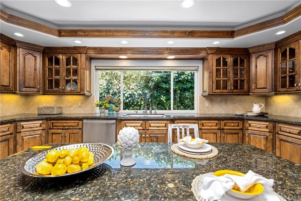 Kitchen plenty of custom cabinets and millwork