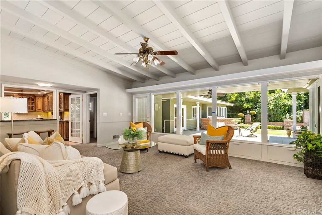 Family room / Den with beamed ceilings