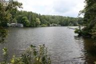 Imagine building a dream home on this wonderful lakefront lot in Highlands NC