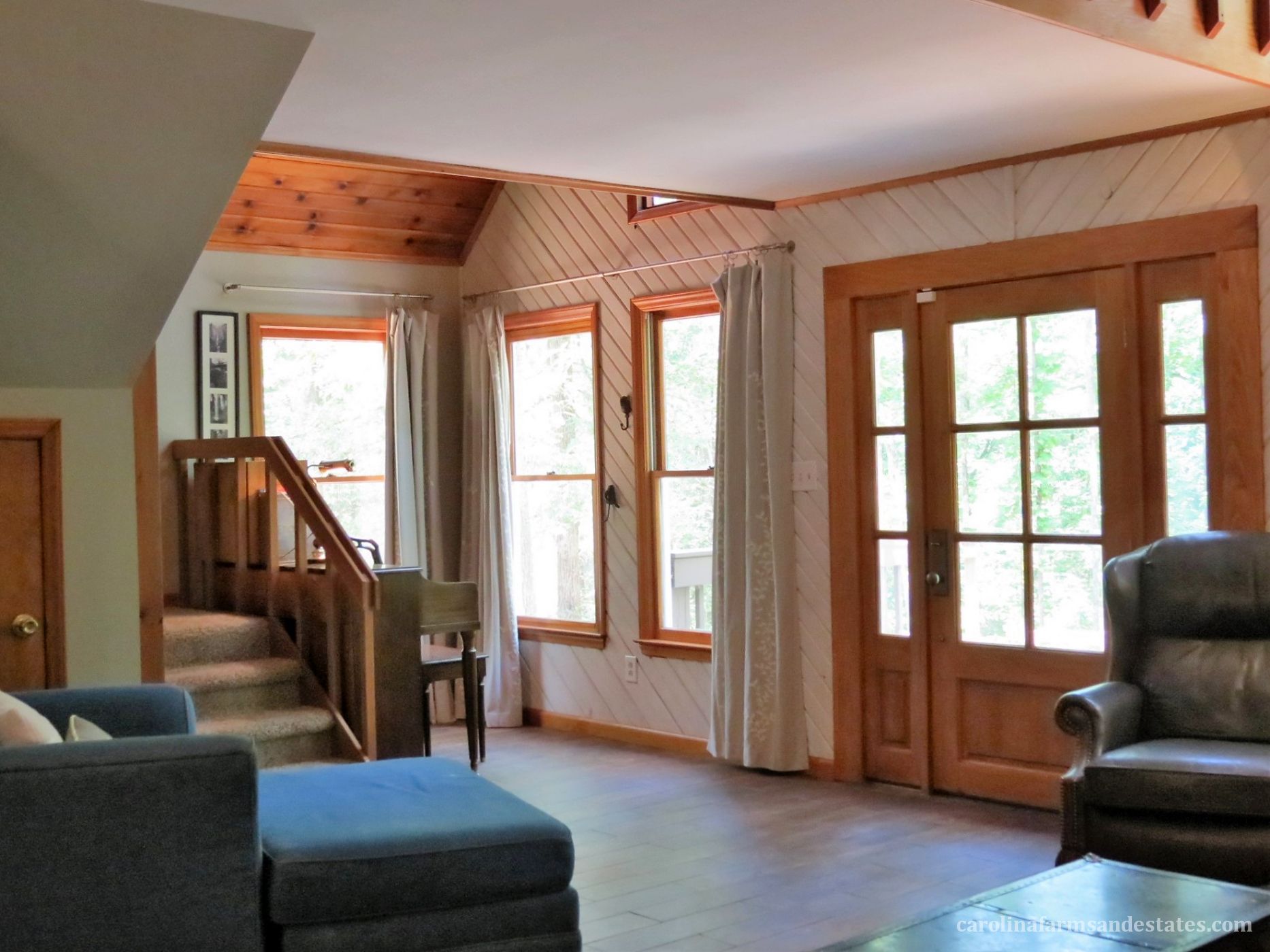 Plenty of windows and Mahogany front exterior door allows natural light & views!