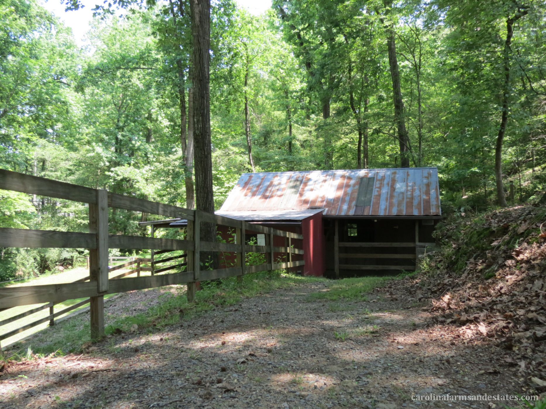 The 3-stall barn with tack room and overhang ideal for horses, small animals and chickens