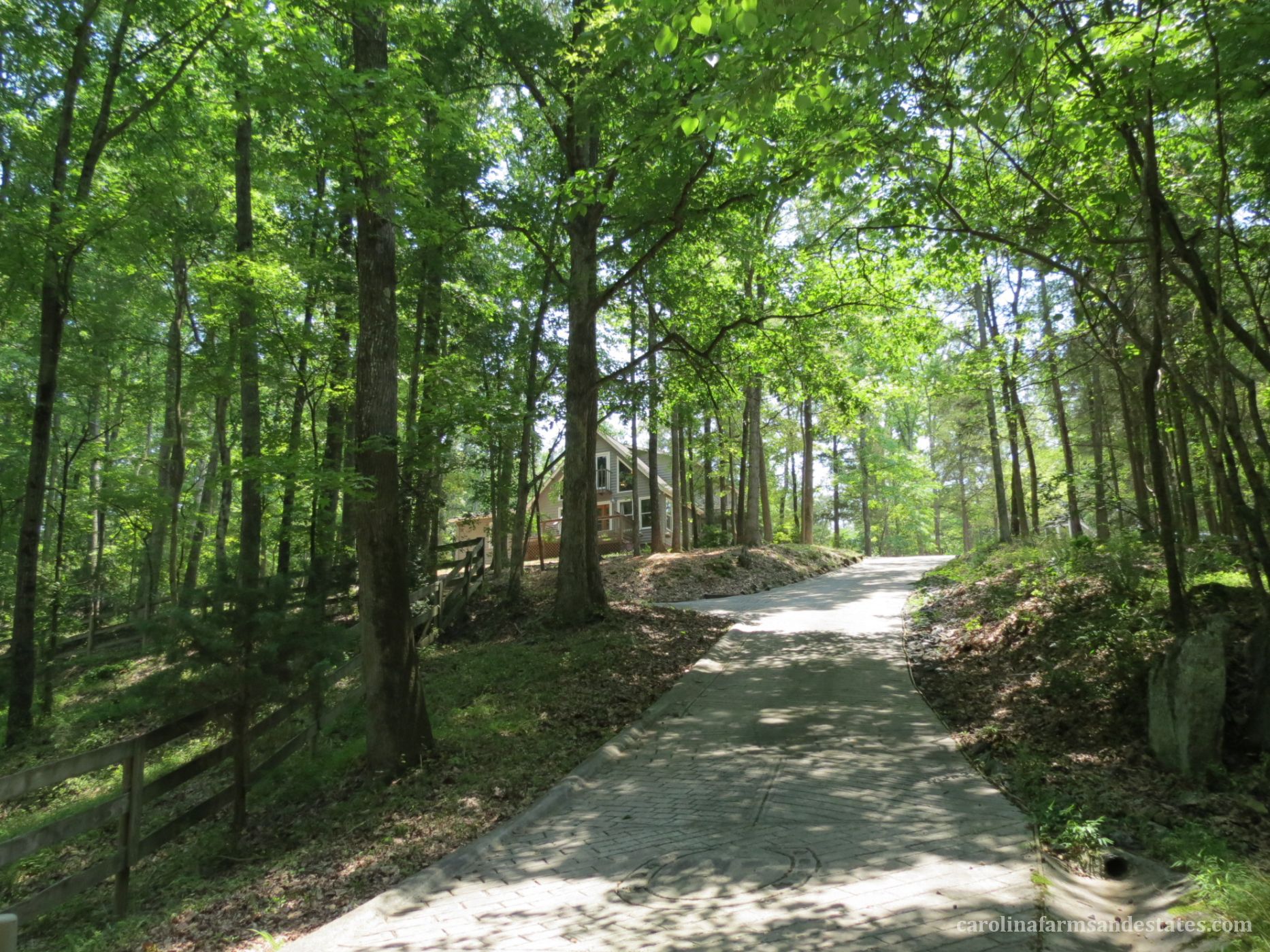 The home sits nicely up on a hilltop with fantastic views of the surrounding hardwoods.
