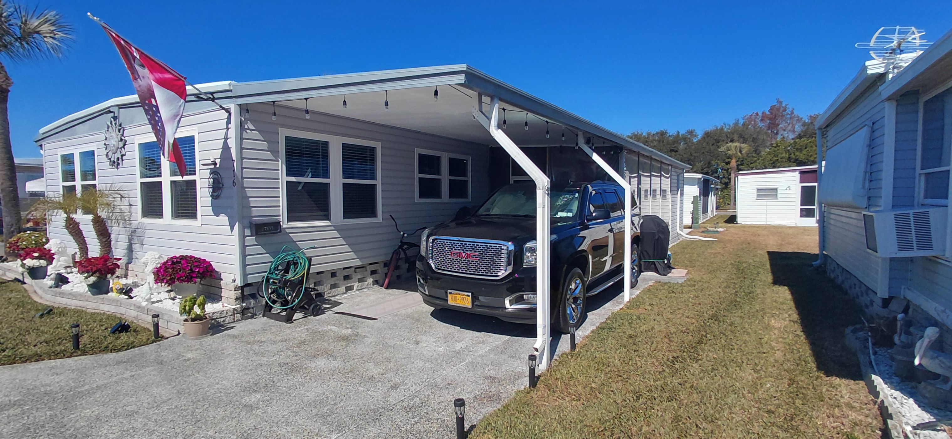 Extended Carport/Epoxy Sealed Driveway