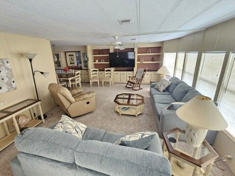 spacious living room view from exit door spacious living room view from exit door