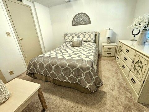 Guest bedroom view from hall bath Guest bedroom view from hall bath