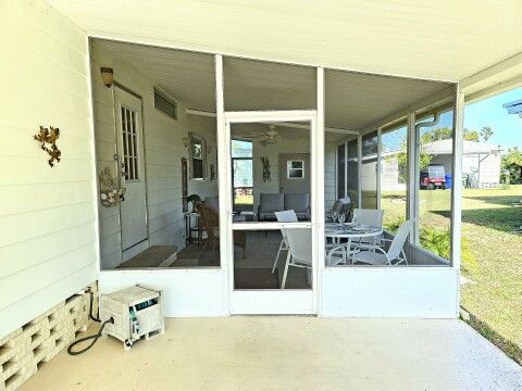 carport view of screen room carport view of screen room