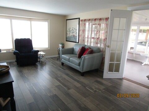 view of living from hall, new french doors