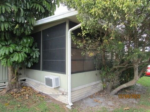 southeast exterior view of raised screen room