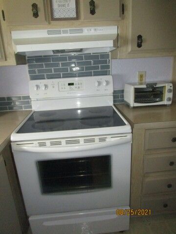 close up new vent hood, conv. oven