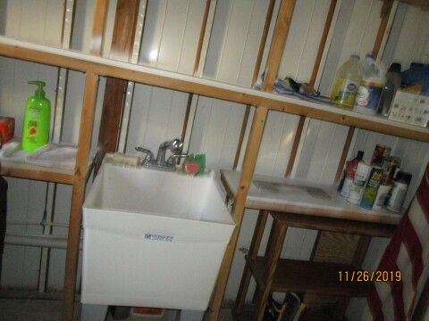 wash tub, storage shelves