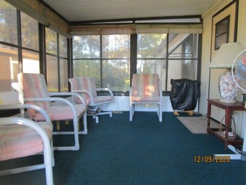 raised vinyl screened room