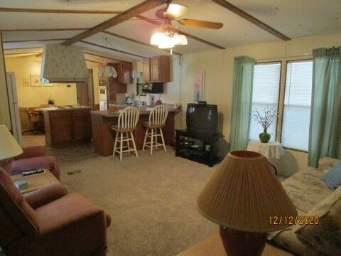 living room view from raised screen room