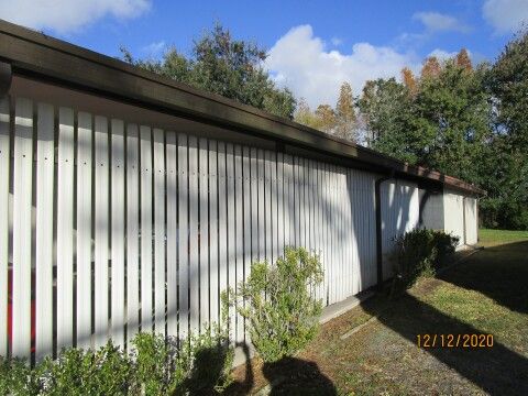 south side privacy carport 
