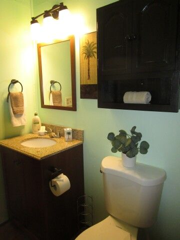 vanity, toilet view from hall bathtub