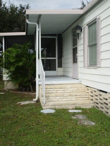 front raised covered porch faces North