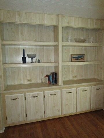 large wall to wall bookcase, cabinets
