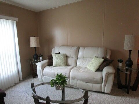 modern sofa, coffee/end tables, lamps