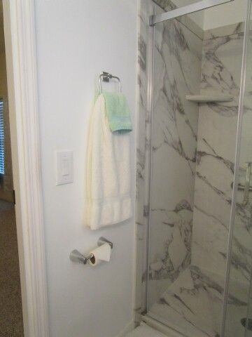 tiled ensuite shower surround, glass shower doors