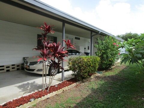 long carport on West side, NEW mulch