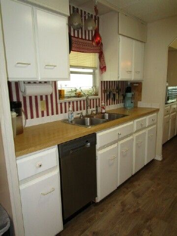Galley kitchen dw, sink under window