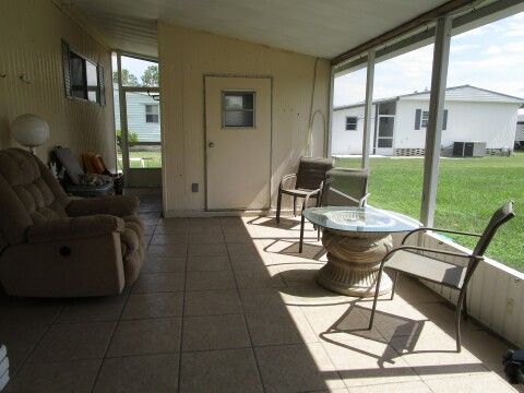 lower 12 x 16 Screen room, utility shed entry