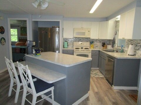 renovated kitchen with island seating