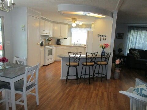 view of kitchen, living, dining from hall