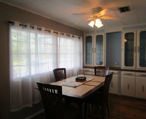 bright dining area with built-in hutch