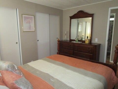 guest room corner view, closet, dresser