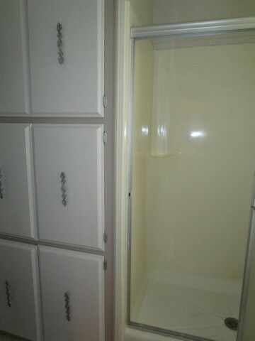 ensuite WI shower, linen storage