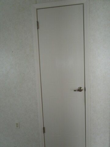 linen closet opposite guest bathroom