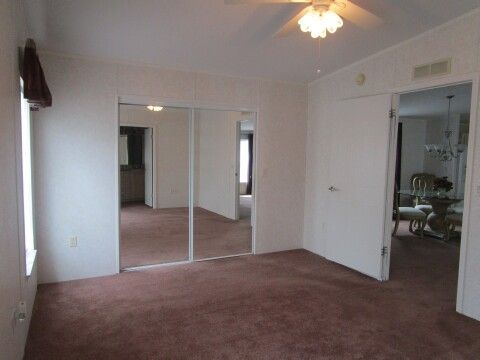 master bedroom other view, mirrored WI closet