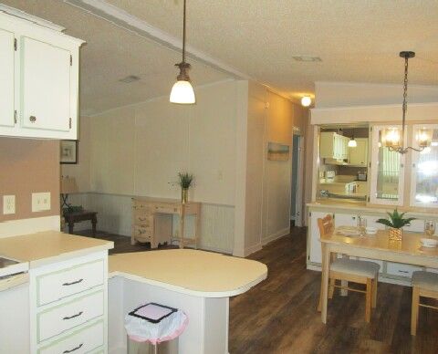 breakfast counter, dining, living areas