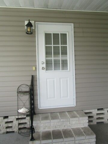carport entry door to kitchen