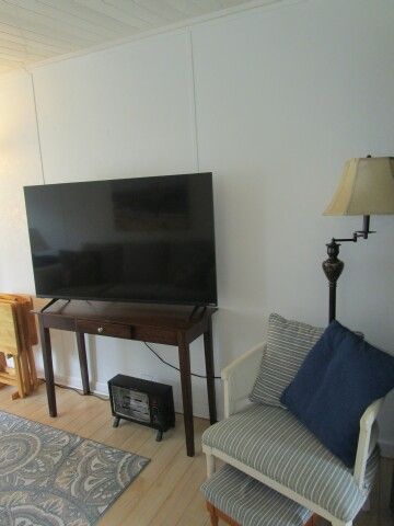 TV, chair in room addition