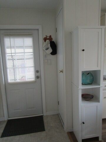 exit door, pantry, storage cabinet