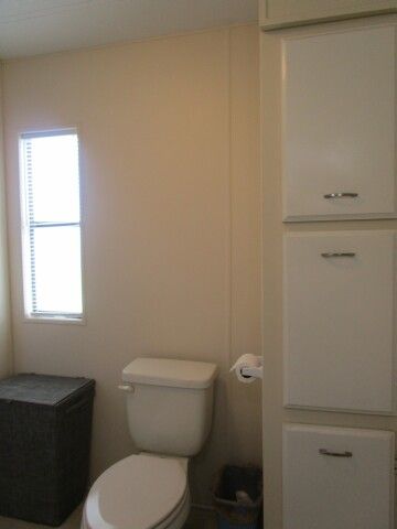 ensuite toilet, linen storage