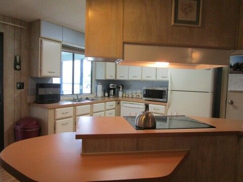 open kitchen with breakfast counter