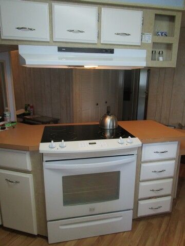 kitchen built-in flat top range, extra cabinetry