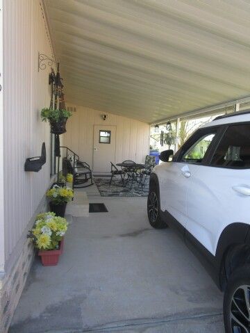 carpor, patio area, shed