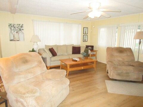lr sofa, 2 large recliners, view from dining area